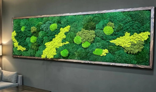 Handcrafted moss artwork with vibrant green preserved moss arranged in an organic landscape pattern inside a wooden frame. Handcrafted moss artwork with vibrant green preserved moss arranged in an organic landscape pattern inside a wooden frame.